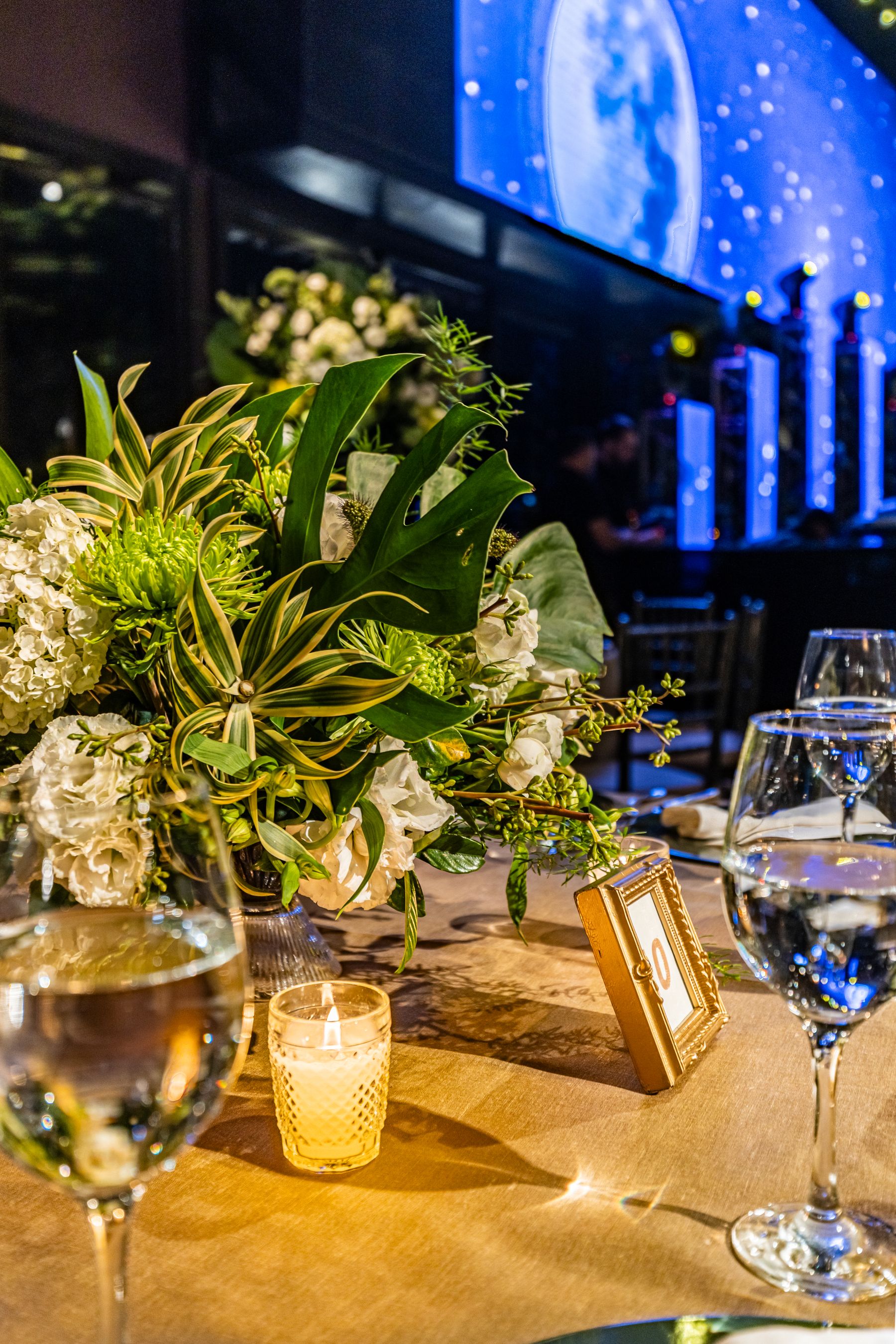 Flowers and candlelight on an elegant dining table